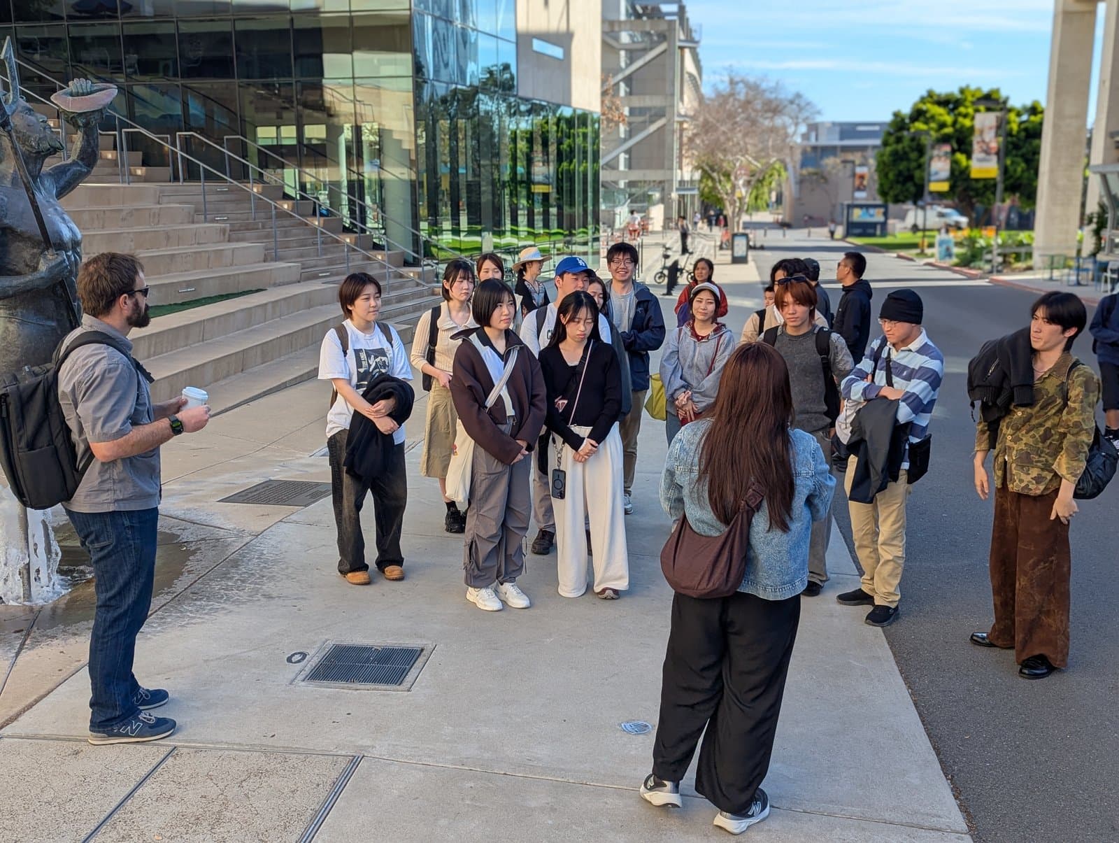 A staff member briefing Chuo University participants on the UC San Diego campus