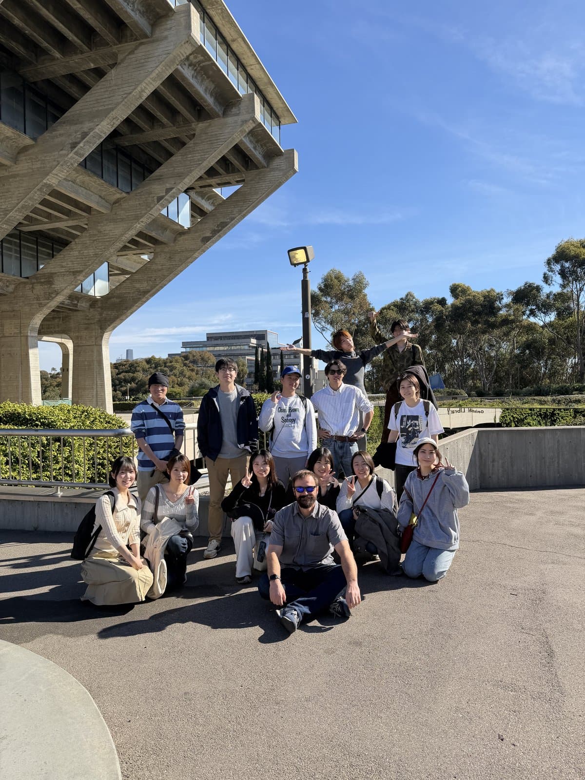 Chuo University participants and staff gathered in front of Geisel Library