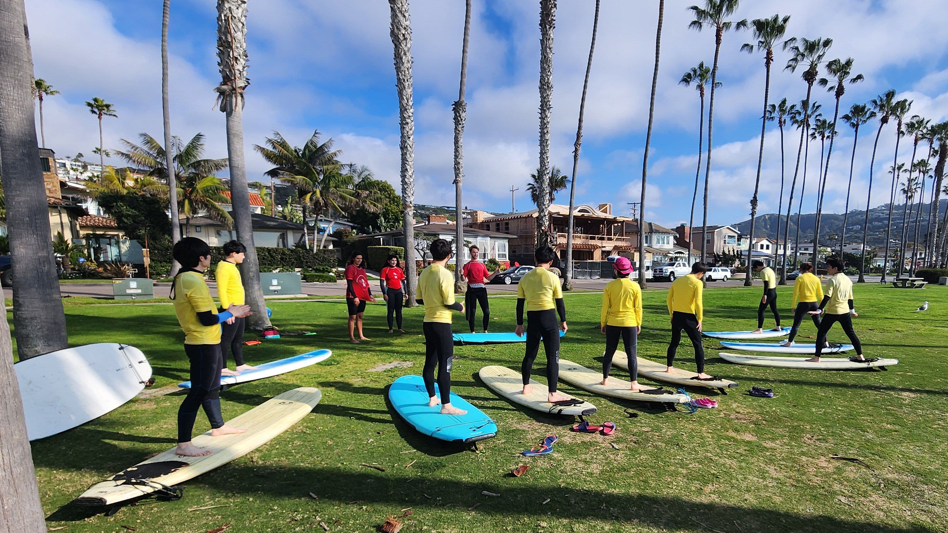 Students enjoying beach activities and surfing at La Jolla