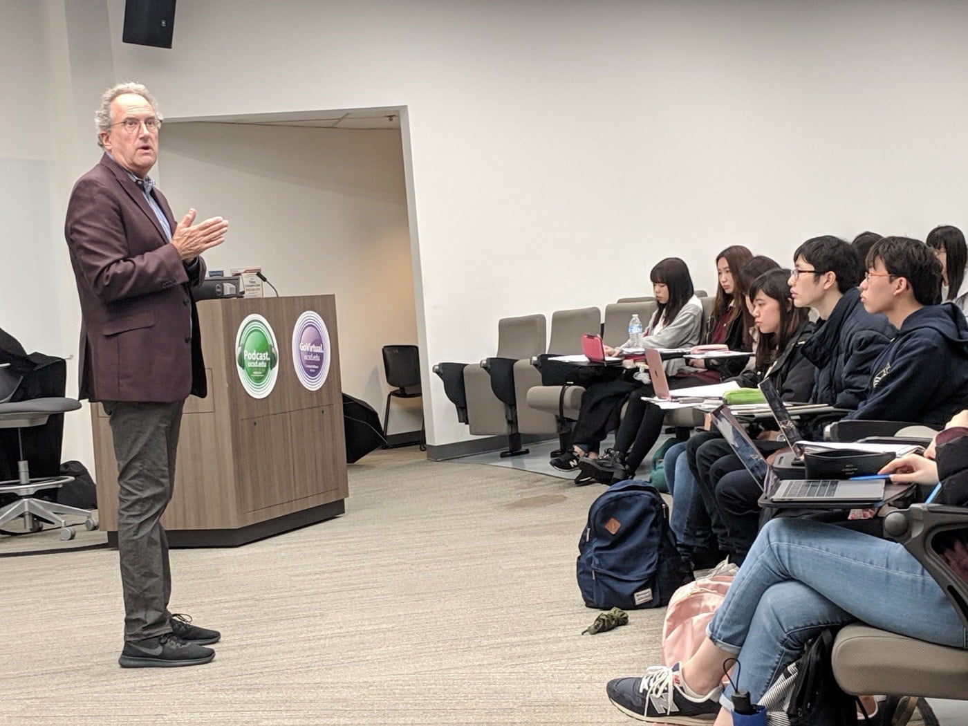 UC San Diego professor leading a seminar discussion with FGL students